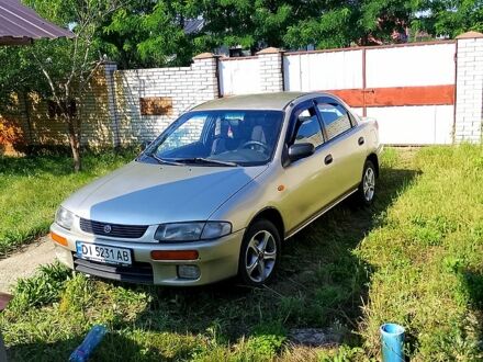 Бежевий Мазда 323, об'ємом двигуна 1.5 л та пробігом 0 тис. км за 2333 $, фото 1 на Automoto.ua