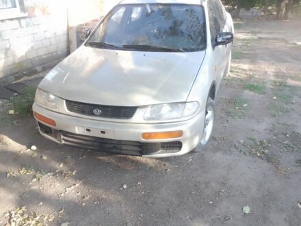 Бежевый Мазда 323, объемом двигателя 0 л и пробегом 253 тыс. км за 1600 $, фото 1 на Automoto.ua