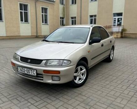 Бежевий Мазда 323, об'ємом двигуна 1.49 л та пробігом 290 тис. км за 1050 $, фото 1 на Automoto.ua
