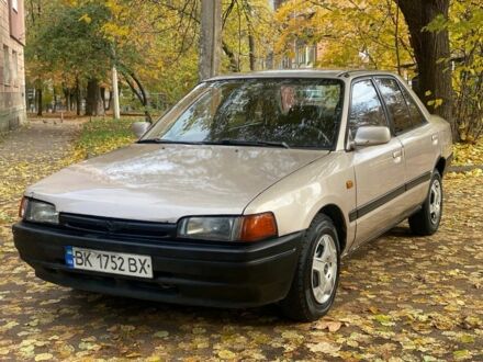 Бежевий Мазда 323, об'ємом двигуна 1.6 л та пробігом 400 тис. км за 899 $, фото 1 на Automoto.ua