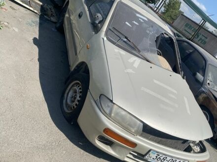 Бежевий Мазда 323, об'ємом двигуна 1.5 л та пробігом 255 тис. км за 400 $, фото 1 на Automoto.ua