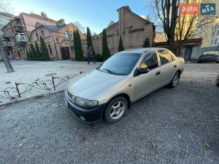 Бежевий Мазда 323, об'ємом двигуна 1.5 л та пробігом 324 тис. км за 2150 $, фото 1 на Automoto.ua