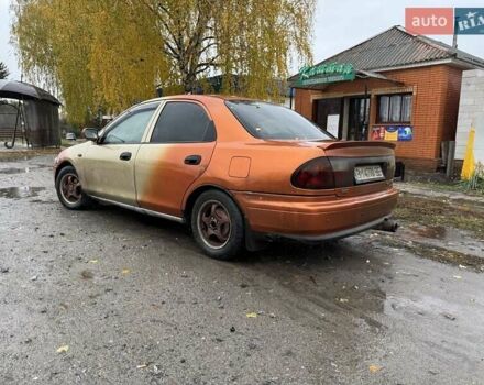 Бежевий Мазда 323, об'ємом двигуна 1.5 л та пробігом 300 тис. км за 1500 $, фото 1 на Automoto.ua