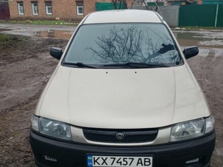 Бежевый Мазда 323, объемом двигателя 1.5 л и пробегом 250 тыс. км за 2700 $, фото 1 на Automoto.ua