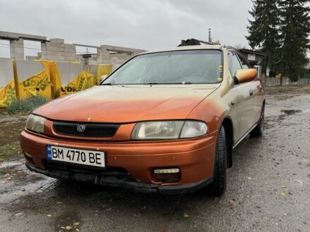 Бежевий Мазда 323, об'ємом двигуна 1.5 л та пробігом 300 тис. км за 1500 $, фото 1 на Automoto.ua