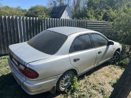 Бежевий Мазда 323, об'ємом двигуна 0 л та пробігом 238 тис. км за 750 $, фото 1 на Automoto.ua