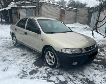 Бежевий Мазда 323, об'ємом двигуна 1.5 л та пробігом 300 тис. км за 1990 $, фото 1 на Automoto.ua