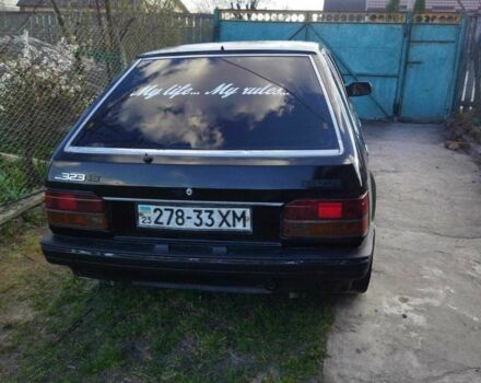 Чорний Мазда 323, об'ємом двигуна 1.5 л та пробігом 249 тис. км за 750 $, фото 2 на Automoto.ua