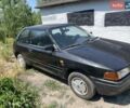 Черный Мазда 323, объемом двигателя 1.3 л и пробегом 100 тыс. км за 300 $, фото 1 на Automoto.ua