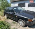 Чорний Мазда 323, об'ємом двигуна 1.3 л та пробігом 100 тис. км за 300 $, фото 1 на Automoto.ua