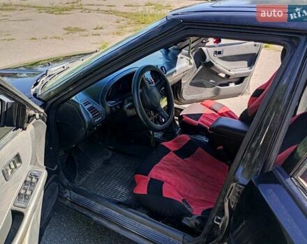 Чорний Мазда 323, об'ємом двигуна 1.84 л та пробігом 320 тис. км за 1900 $, фото 11 на Automoto.ua