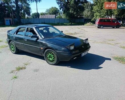 Чорний Мазда 323, об'ємом двигуна 1.84 л та пробігом 320 тис. км за 1900 $, фото 3 на Automoto.ua