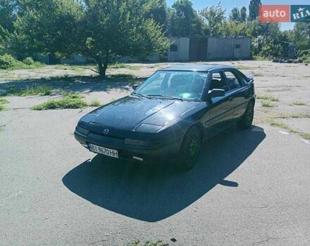 Чорний Мазда 323, об'ємом двигуна 1.84 л та пробігом 320 тис. км за 1900 $, фото 1 на Automoto.ua