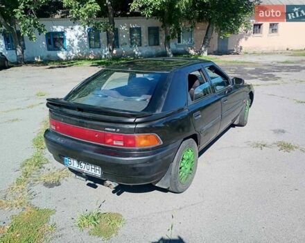 Чорний Мазда 323, об'ємом двигуна 1.84 л та пробігом 320 тис. км за 1900 $, фото 5 на Automoto.ua
