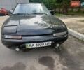 Черный Мазда 323, объемом двигателя 1.8 л и пробегом 313 тыс. км за 650 $, фото 1 на Automoto.ua