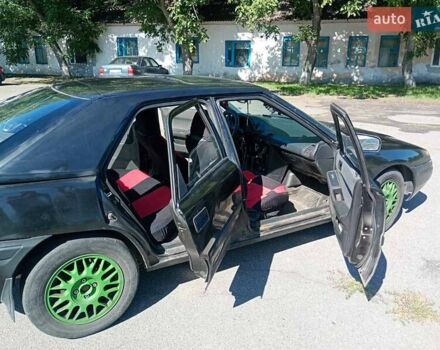 Чорний Мазда 323, об'ємом двигуна 1.84 л та пробігом 320 тис. км за 1900 $, фото 6 на Automoto.ua