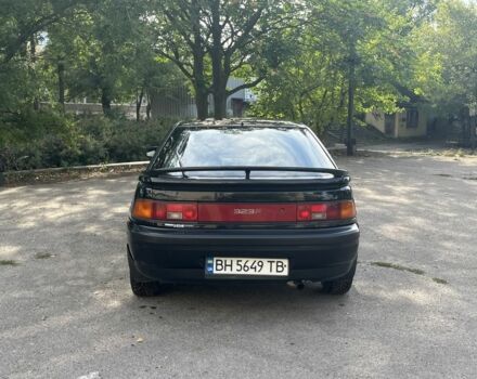 Чорний Мазда 323, об'ємом двигуна 1.9 л та пробігом 200 тис. км за 1750 $, фото 4 на Automoto.ua