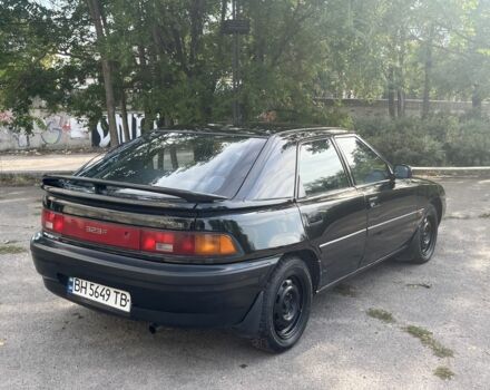 Чорний Мазда 323, об'ємом двигуна 1.9 л та пробігом 200 тис. км за 1750 $, фото 5 на Automoto.ua
