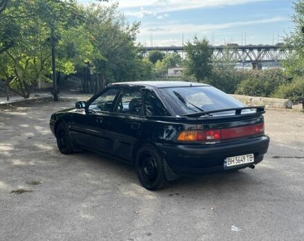 Чорний Мазда 323, об'ємом двигуна 1.9 л та пробігом 200 тис. км за 1750 $, фото 3 на Automoto.ua