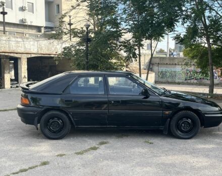Чорний Мазда 323, об'ємом двигуна 1.9 л та пробігом 200 тис. км за 1750 $, фото 6 на Automoto.ua