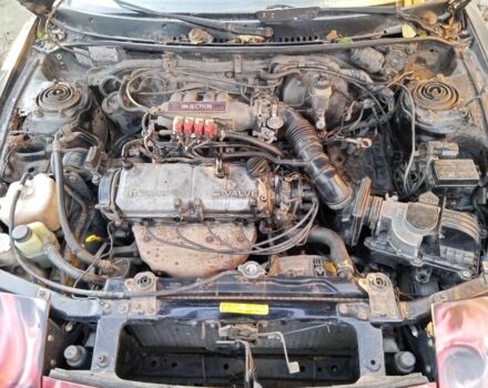 Черный Мазда 323, объемом двигателя 1 л и пробегом 400 тыс. км за 592 $, фото 3 на Automoto.ua