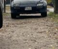 Черный Мазда 323, объемом двигателя 1.5 л и пробегом 230 тыс. км за 2300 $, фото 1 на Automoto.ua