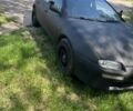 Черный Мазда 323, объемом двигателя 1.5 л и пробегом 300 тыс. км за 1452 $, фото 1 на Automoto.ua