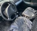 Черный Мазда 323, объемом двигателя 1.5 л и пробегом 300 тыс. км за 1457 $, фото 4 на Automoto.ua