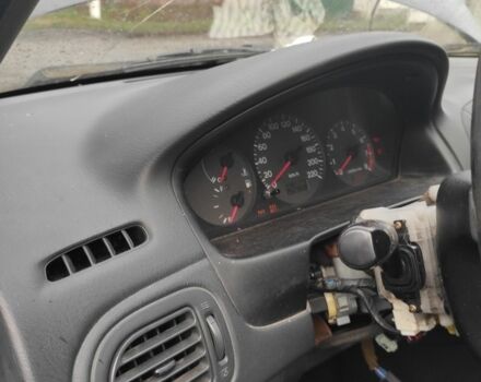 Черный Мазда 323, объемом двигателя 2 л и пробегом 260 тыс. км за 700 $, фото 2 на Automoto.ua