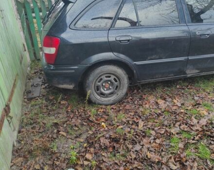 Черный Мазда 323, объемом двигателя 2 л и пробегом 260 тыс. км за 700 $, фото 3 на Automoto.ua