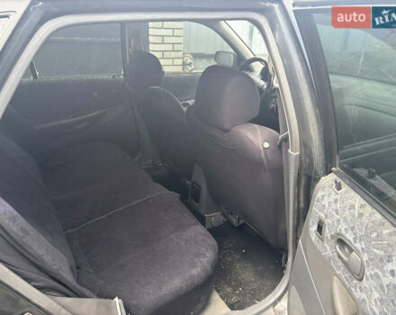 Мазда 323 1999 в Тульчине на Automoto.ua Черный Мазда 323, объемом двигателя 1.5 л и пробегом 247 тыс. км за 2150 $, фото 7 на Automoto.ua
