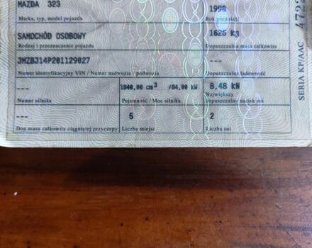 Черный Мазда 323, объемом двигателя 2 л и пробегом 260 тыс. км за 700 $, фото 5 на Automoto.ua