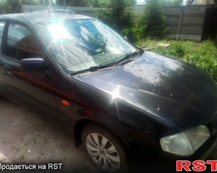 Чорний Мазда 323, об'ємом двигуна 1.5 л та пробігом 0 тис. км за 2100 $, фото 5 на Automoto.ua