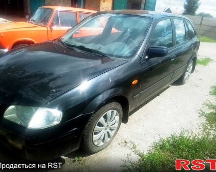 Чорний Мазда 323, об'ємом двигуна 1.5 л та пробігом 0 тис. км за 2100 $, фото 6 на Automoto.ua