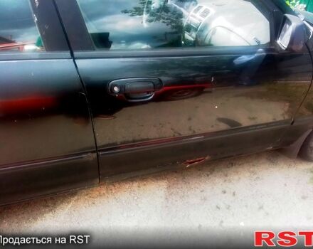 Чорний Мазда 323, об'ємом двигуна 1.5 л та пробігом 0 тис. км за 2100 $, фото 8 на Automoto.ua