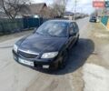 Черный Мазда 323, объемом двигателя 1.6 л и пробегом 283 тыс. км за 2150 $, фото 1 на Automoto.ua
