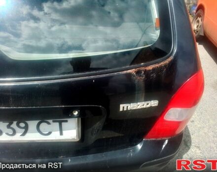 Чорний Мазда 323, об'ємом двигуна 1.5 л та пробігом 0 тис. км за 2100 $, фото 4 на Automoto.ua