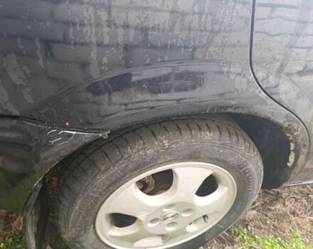 Чорний Мазда 323, об'ємом двигуна 0 л та пробігом 260 тис. км за 1496 $, фото 1 на Automoto.ua
