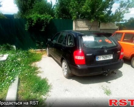 Чорний Мазда 323, об'ємом двигуна 1.5 л та пробігом 0 тис. км за 2100 $, фото 2 на Automoto.ua