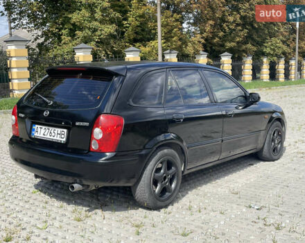 Черный Мазда 323, объемом двигателя 2 л и пробегом 300 тыс. км за 2600 $, фото 5 на Automoto.ua
