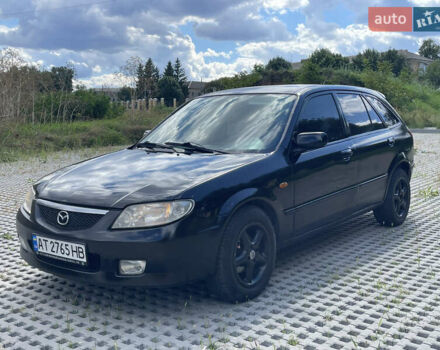 Черный Мазда 323, объемом двигателя 2 л и пробегом 300 тыс. км за 2600 $, фото 1 на Automoto.ua