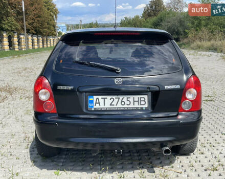 Черный Мазда 323, объемом двигателя 2 л и пробегом 300 тыс. км за 2600 $, фото 4 на Automoto.ua