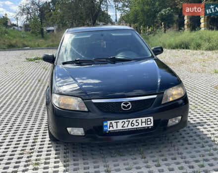 Черный Мазда 323, объемом двигателя 2 л и пробегом 300 тыс. км за 2600 $, фото 9 на Automoto.ua