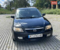 Черный Мазда 323, объемом двигателя 2 л и пробегом 300 тыс. км за 2600 $, фото 9 на Automoto.ua
