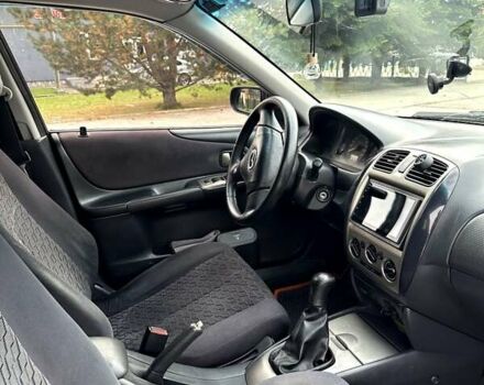 Черный Мазда 323, объемом двигателя 2 л и пробегом 286 тыс. км за 3200 $, фото 19 на Automoto.ua