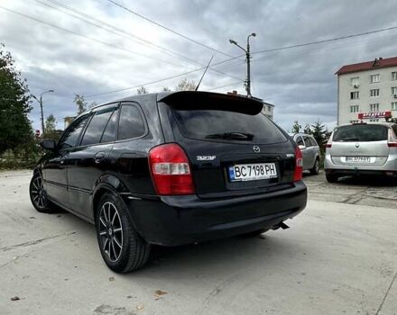 Черный Мазда 323, объемом двигателя 2 л и пробегом 286 тыс. км за 3200 $, фото 3 на Automoto.ua