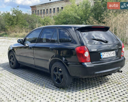 Черный Мазда 323, объемом двигателя 2 л и пробегом 300 тыс. км за 2600 $, фото 3 на Automoto.ua