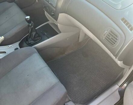 Черный Мазда 323, объемом двигателя 1.6 л и пробегом 250 тыс. км за 2500 $, фото 2 на Automoto.ua