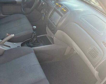 Черный Мазда 323, объемом двигателя 1.6 л и пробегом 250 тыс. км за 2500 $, фото 1 на Automoto.ua