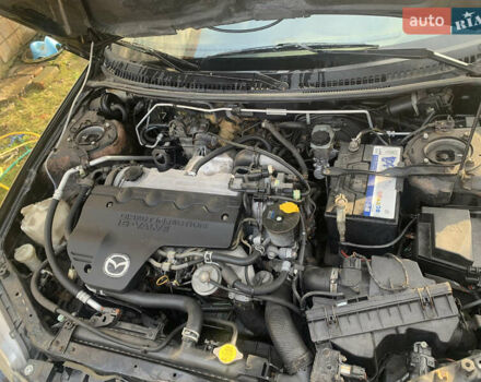 Черный Мазда 323, объемом двигателя 2 л и пробегом 320 тыс. км за 2700 $, фото 8 на Automoto.ua